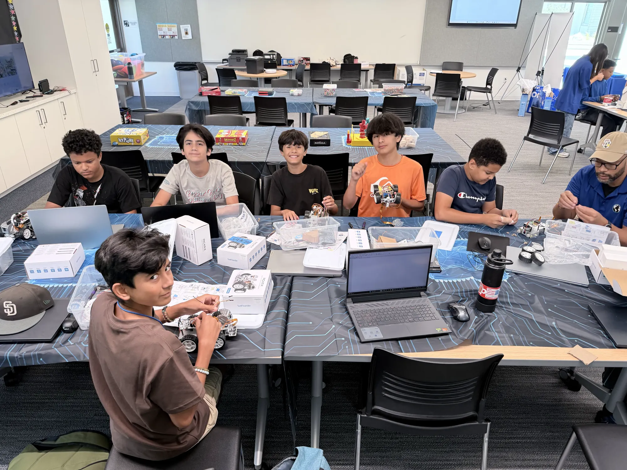 Students building projects in class