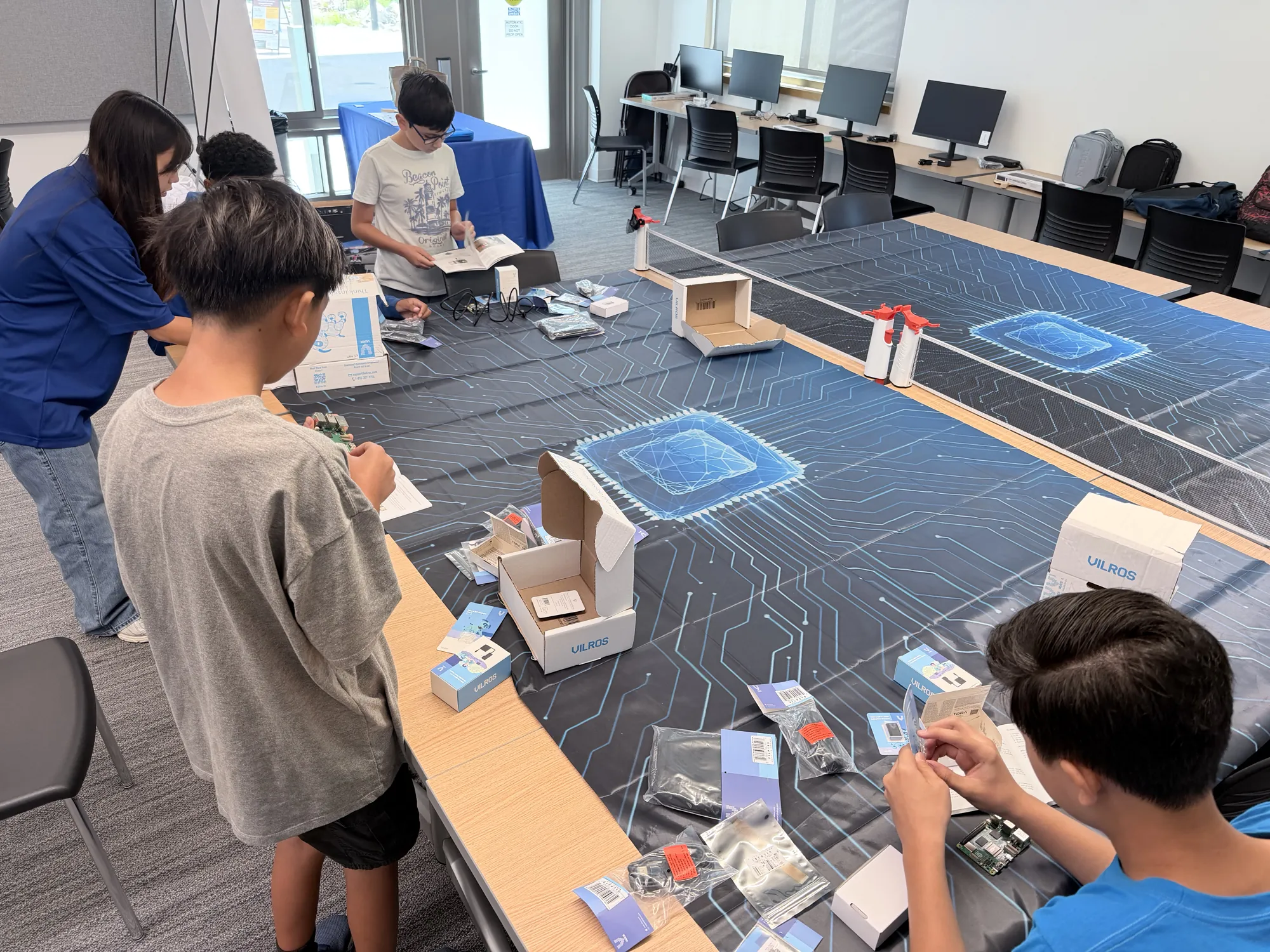 Students unboxing Raspberry Pi kits